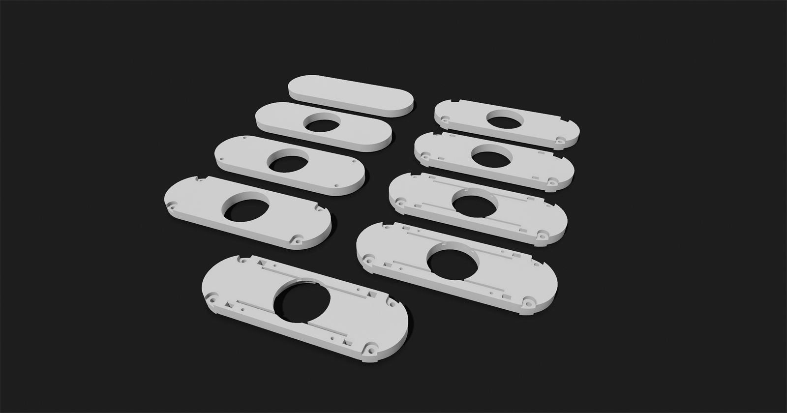 Rendered batch of white rounded clip parts with centre holes
